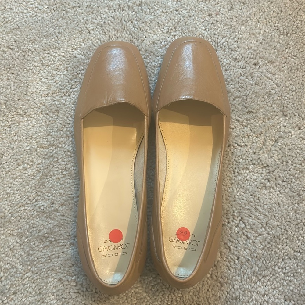 Joan&david flats, never worn. Outside is a light tan, inside is more cream color